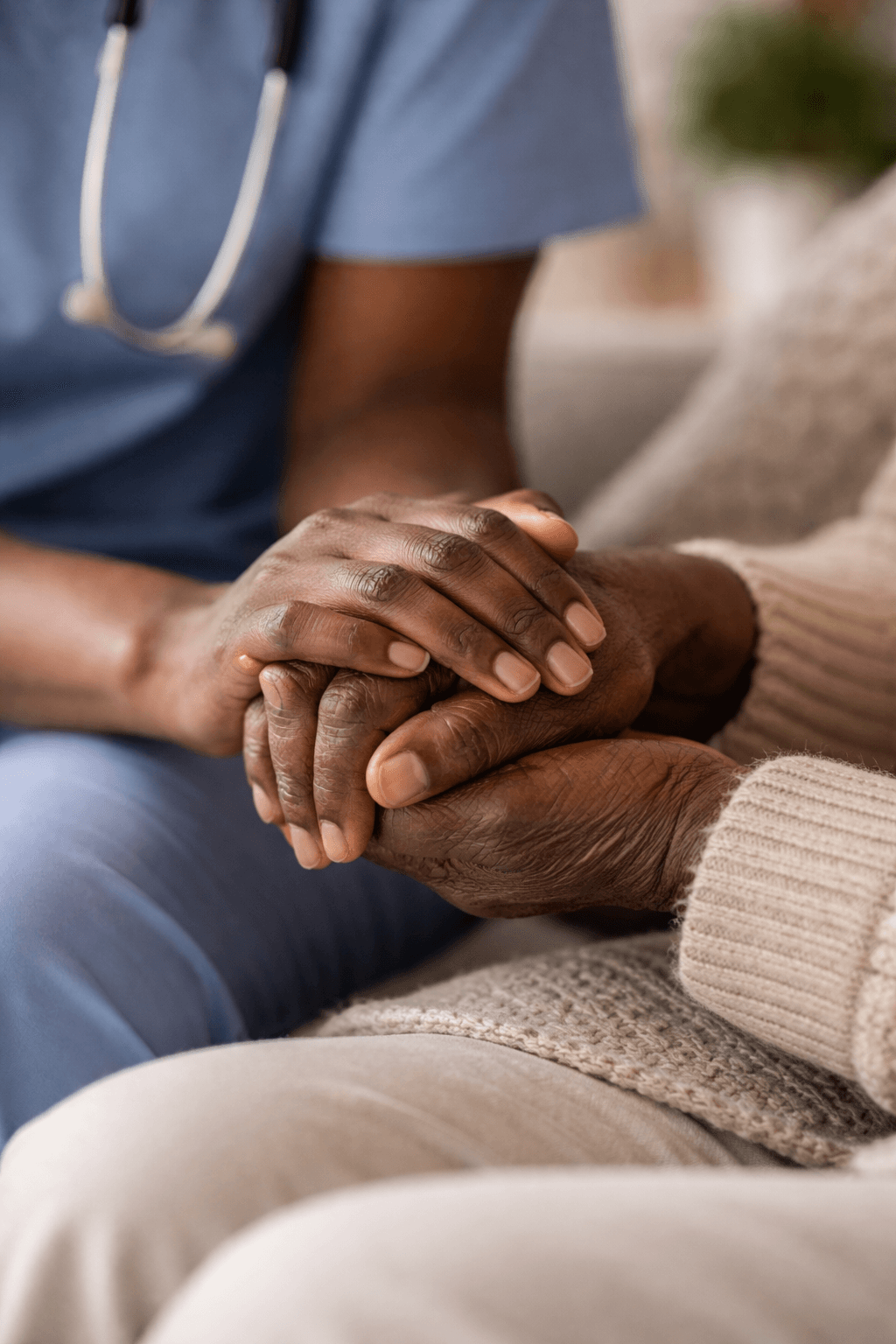 Carer assisting an older adult at home